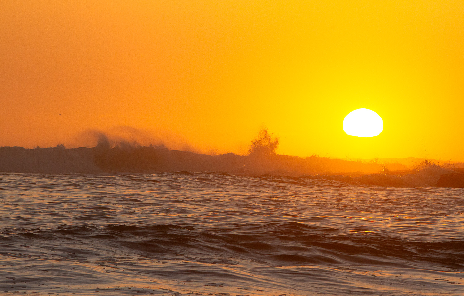 The sun sets off the coast of Natural Bridges State Marine Reserve in California on Nov. 2, 2025.