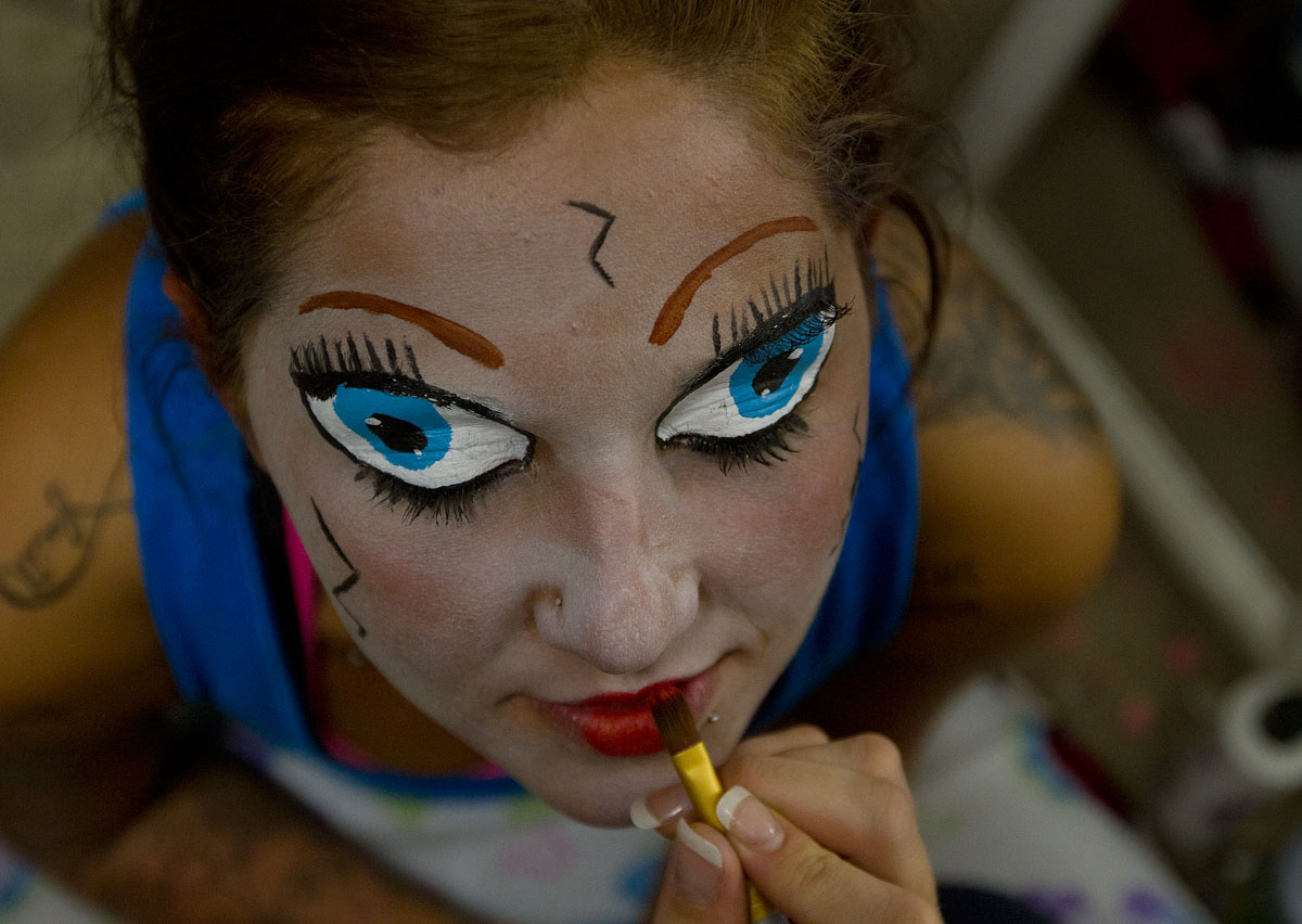 Brittnee Dailey of Bowling Green has makeup put on by Brittany Cline before the opening of The Apocalypse Haunted Attraction at 1210 Church Street Oct. 5, 2012. Cline's husband, Sammy Martin, opened the haunted house for the first time in 2012. He and his children live for Halloween, Cline said.
