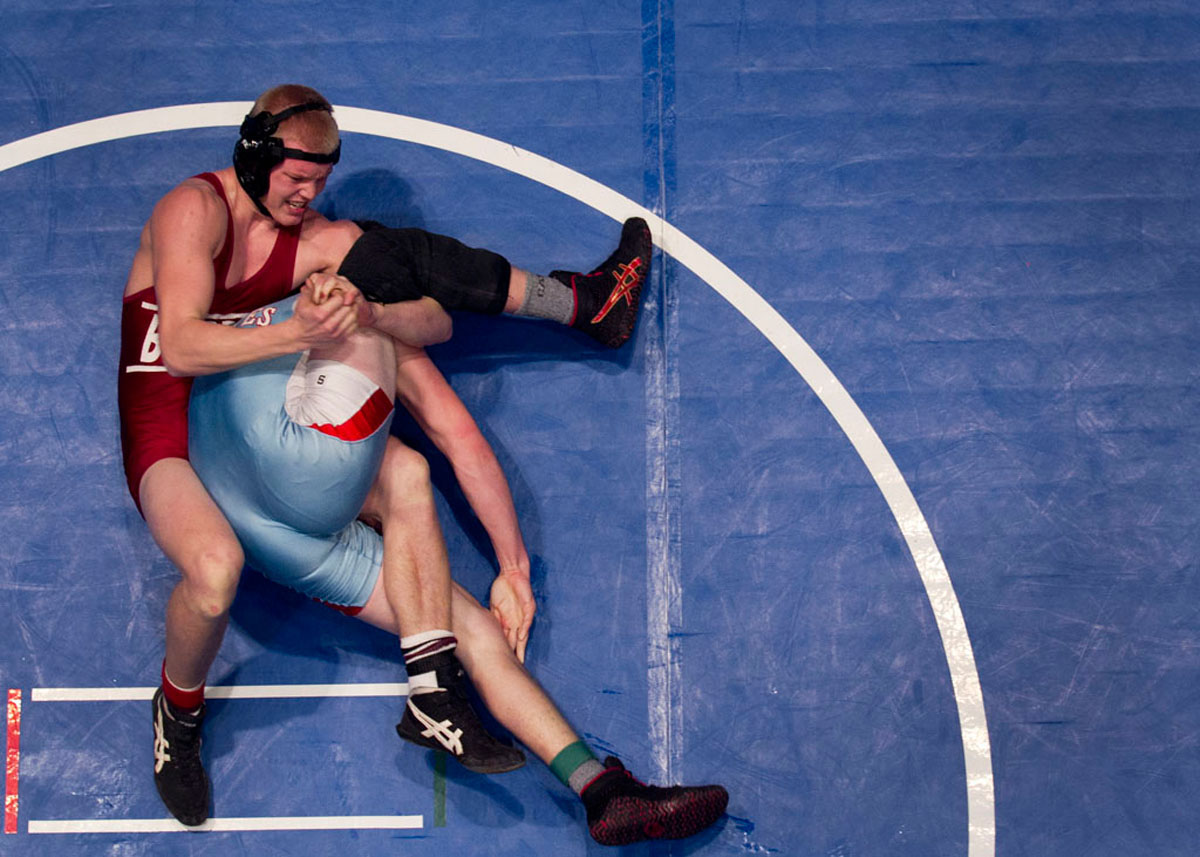 Defending state champion Brandon Barnett, a senior from Harrison County, puts a hold on Union County senior Thomas Buckman in the 189 pound championship match at the Kentucky High School Athletics Association State Wrestling Tournament Feb. 19, 2011. Buckman went on to defeat Barnett, handing him his first loss in two years.