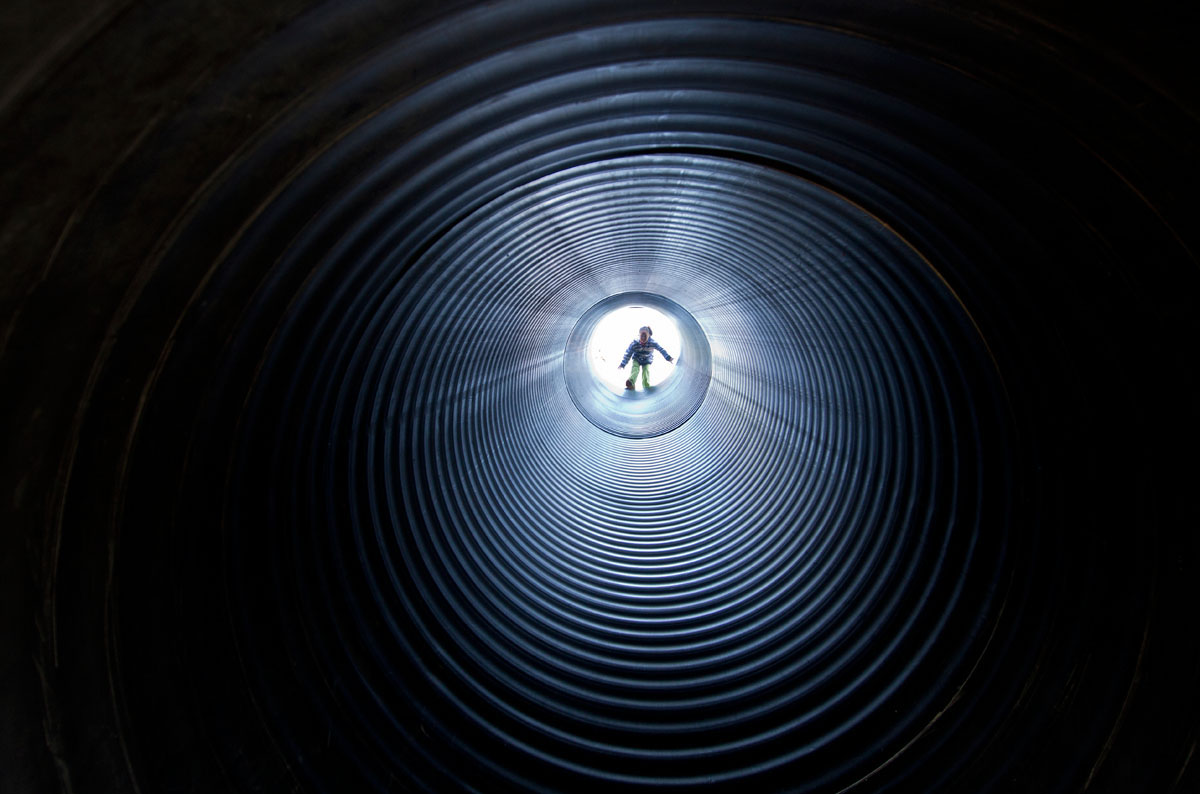 Six-year-old Keira Bailey of Glasgow prepares to go down a tunnel slide at Chaney's Dairy Barn Saturday Oct. 6, 2012. Chaney's held its annual Pumpkin Pickin' Festival Saturday and Sunday to celebrate its ninth anniversary.